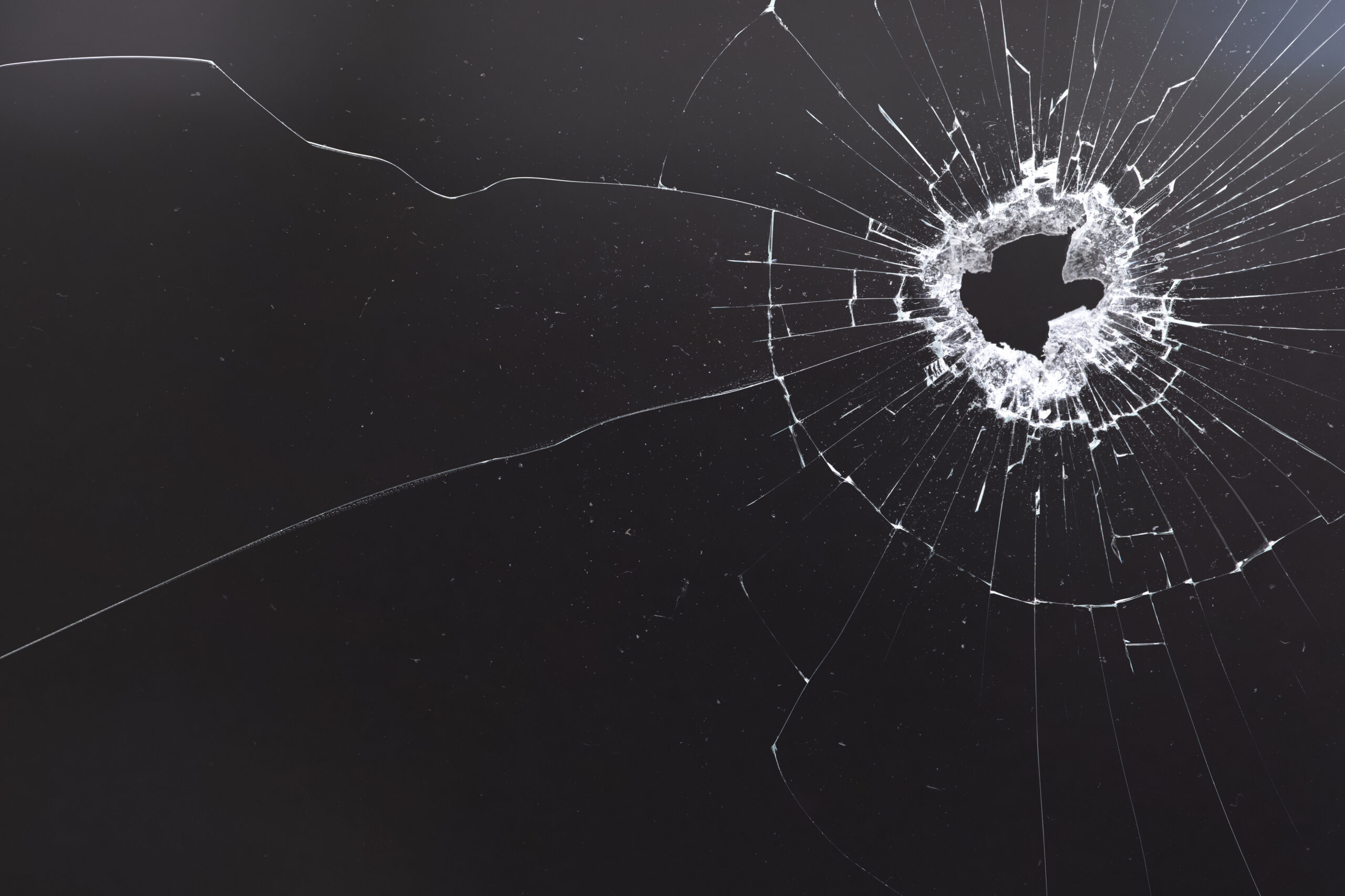 Black background with shattered glass texture